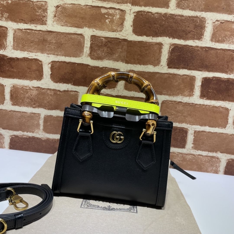 G*u*i top handle bags